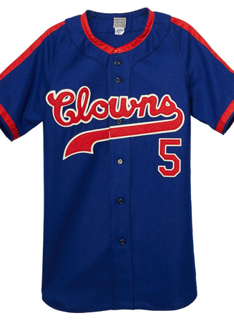 The EFF Indianapolis Clowns 1952 Road Jersey is a blue button-up with red trim, “Clowns” in white and red script across the chest, and number 5 on the lower right—honoring Henry Aaron’s time in the Negro Leagues.