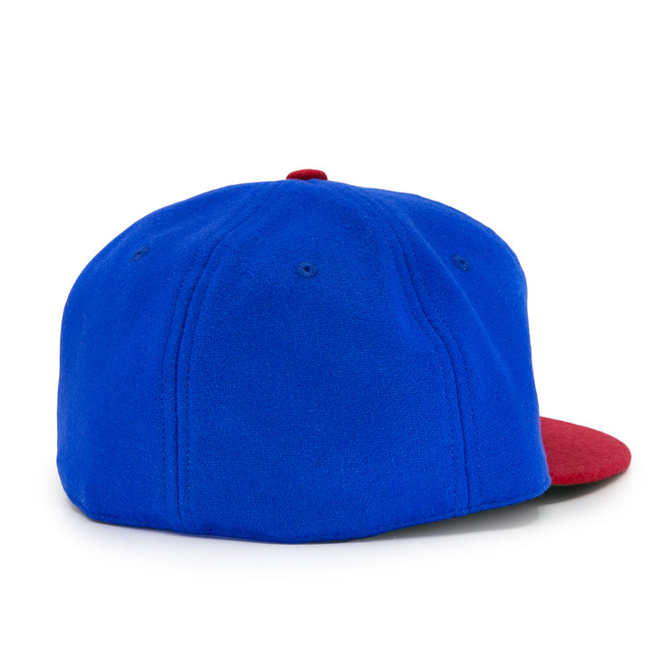 The EFF Montreal Royals 1935 Vintage Ballcap features a blue crown and red brim, shown from the back and at an angle on a white background, capturing the classic style of the original 1935 ballcap.
