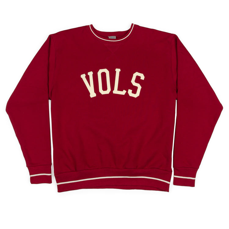 The Nashville Vols Vintage Crewneck Sweatshirt by EFF is a red USA-made top with VOLS in bold white letters across the chest and crisp white trim on the collar, cuffs, and waistband.