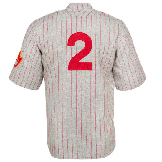The EFF Nagoya Club 1938 Road Jersey features a gray design with thin red stripes, bold red number 2 on the back, and a red and yellow left sleeve patch—authentic Japanese League style inspired by Chunichi Dragons.