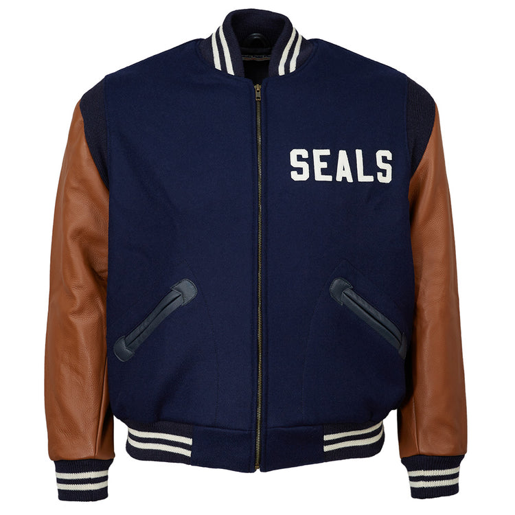 The EFF San Francisco Seals 1949 Authentic Jacket features navy blue wool, brown leather sleeves, black pockets, white stripes on the collar, cuffs and waistband, and “SEALS” in white on the left chest.