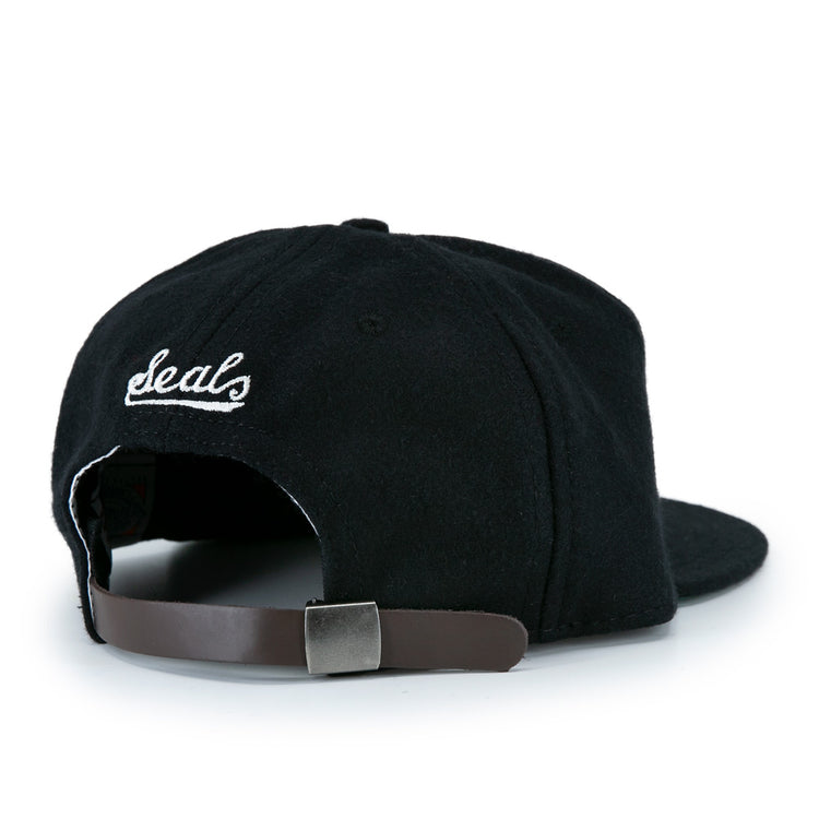 The San Francisco Seals Vintage Inspired Ballcap by EFF features “deals” embroidered in white thread on the back, plus an adjustable brown leather strap with a metal buckle, inspired by vintage wool baseball caps.