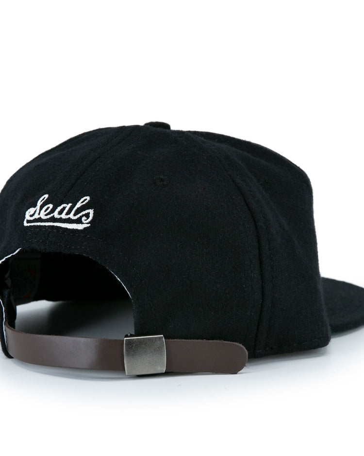 The San Francisco Seals Vintage Inspired Ballcap by EFF features “deals” embroidered in white thread on the back, plus an adjustable brown leather strap with a metal buckle, inspired by vintage wool baseball caps.