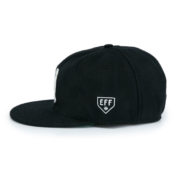 The San Francisco Seals Vintage Inspired Ballcap by EFF is a black flat-bill cap with a small white EFF shield logo on the side panel, recalling classic vintage wool baseball styles.