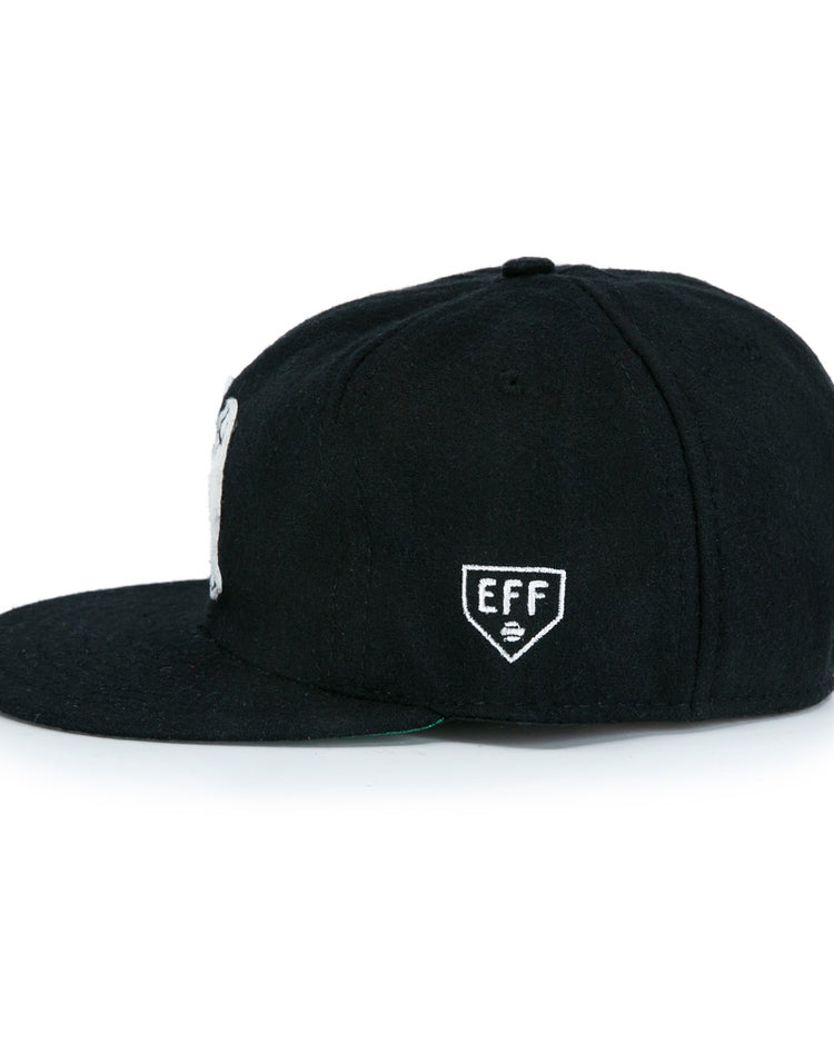 The San Francisco Seals Vintage Inspired Ballcap by EFF is a black flat-bill cap with a small white EFF shield logo on the side panel, recalling classic vintage wool baseball styles.