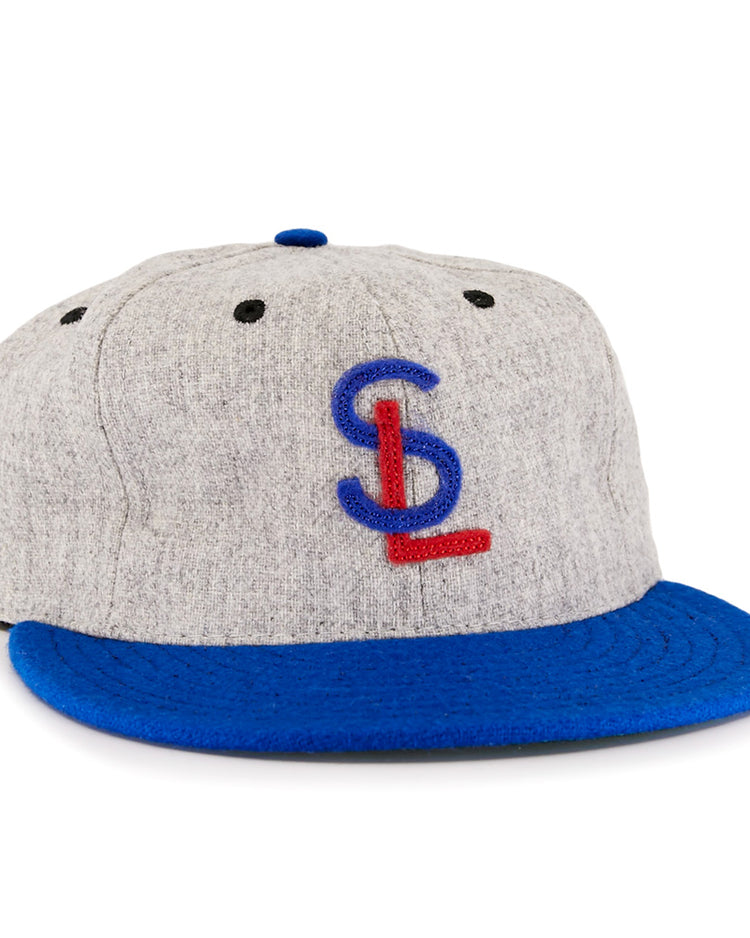 The EFF St. Louis Stars 1929 Vintage Ballcap features a gray body, blue brim, and blue/red embroidered SL initials—paying tribute to the Negro National League’s iconic 1929 original.
