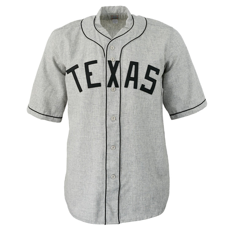 The EFF Texas Black Spiders 1938 Road Jersey is a gray button-up with black piping and TEXAS in bold black letters, authentically reproducing the historic barnstorming teams look and celebrating baseball heritage.