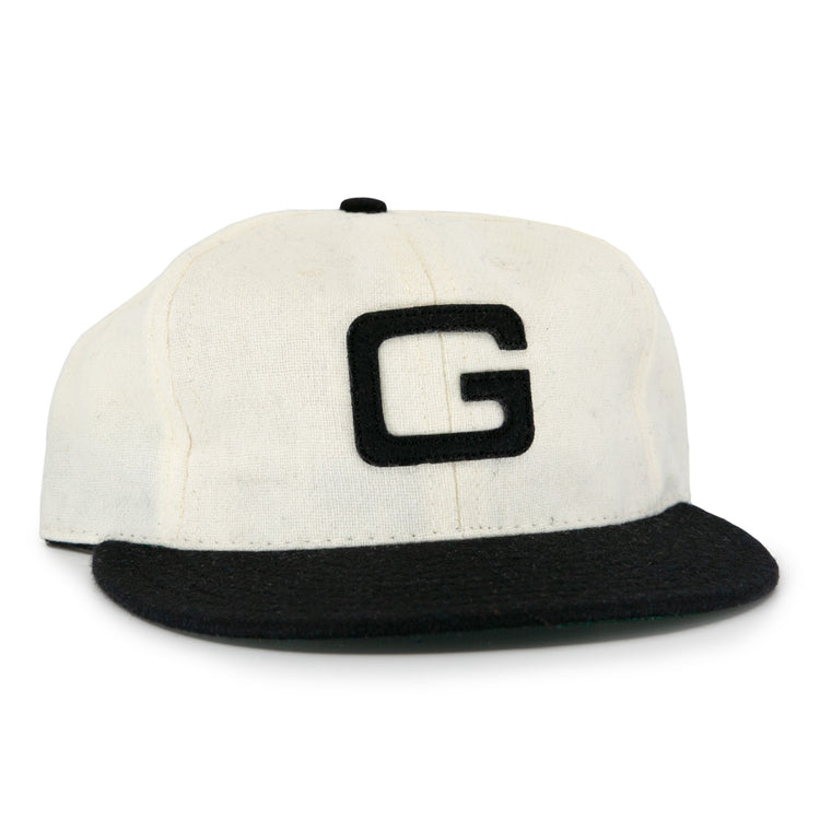 The Tokyo Kyojin (Giants) 1948 Vintage Ballcap by Ebbets Field Flannels features a white crown, black brim, and bold black G on the front, inspired by an authentic 1948 Japanese baseball cap.