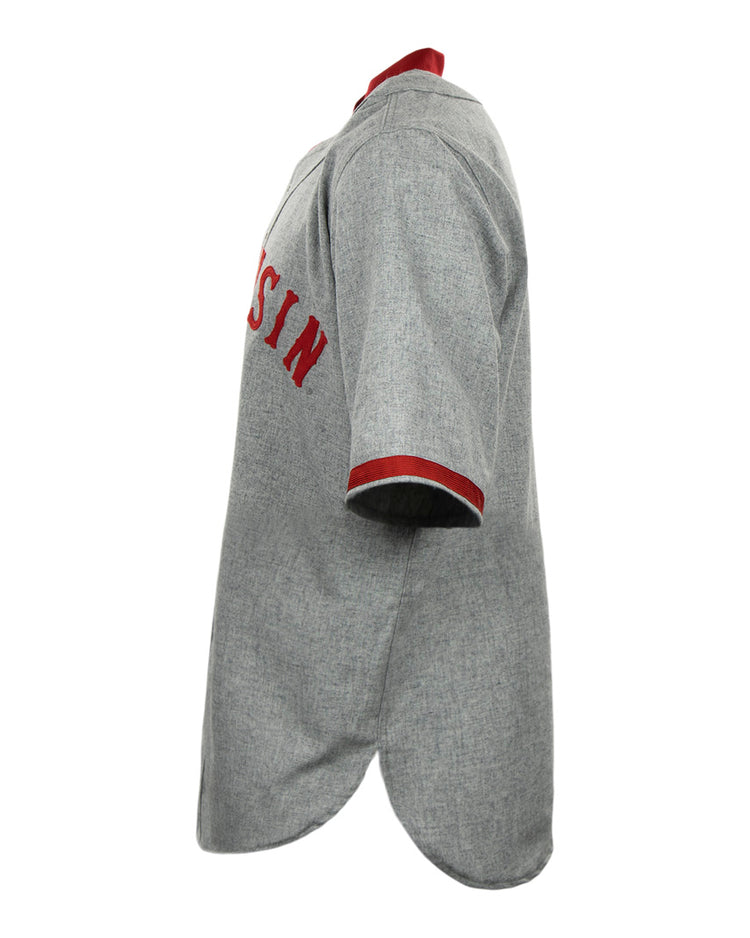 Side view of a vintage gray EFF University of Wisconsin 1930 Road Jersey with red collar and sleeve trim, featuring partial red chest lettering—an authentic flannel reproduction.
