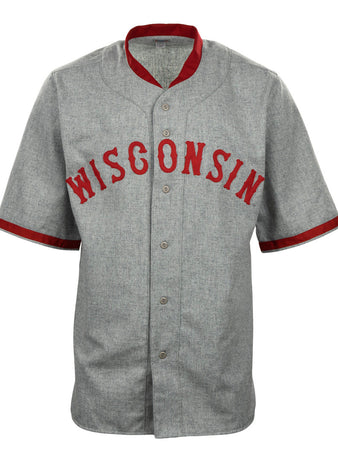 The EFF University of Wisconsin 1930 Road Jersey is a gray button-up with red collar and sleeve trim, featuring WISCONSIN in bold red letters on the chest—a classic Badgers baseball style authentic reproduction.