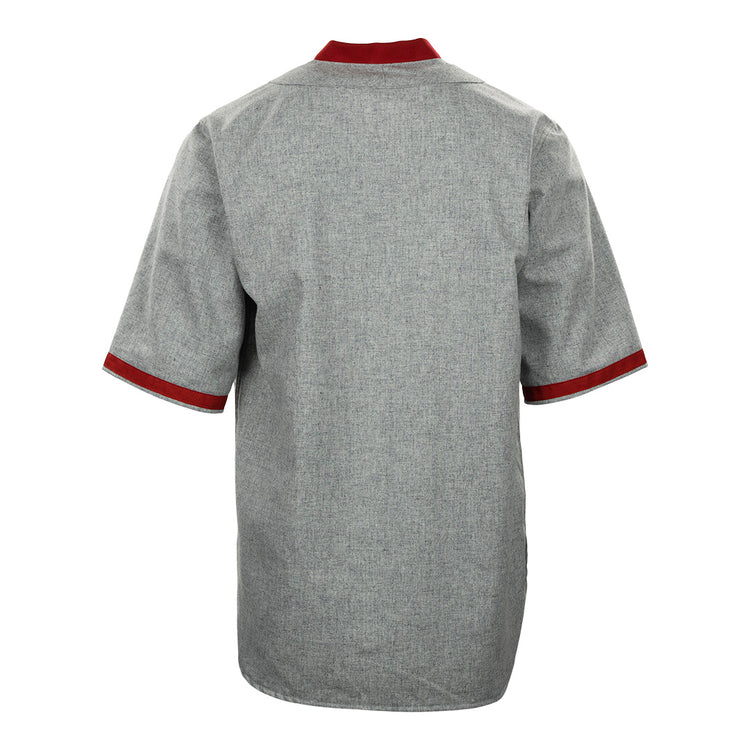 Back view of the EFF University of Wisconsin 1930 Road Jersey, a short-sleeved gray shirt with dark red trim on the collar and cuffs, featuring a straight hem and no visible patterns or logos. Inspired by an authentic 1930 Badgers Baseball jersey.