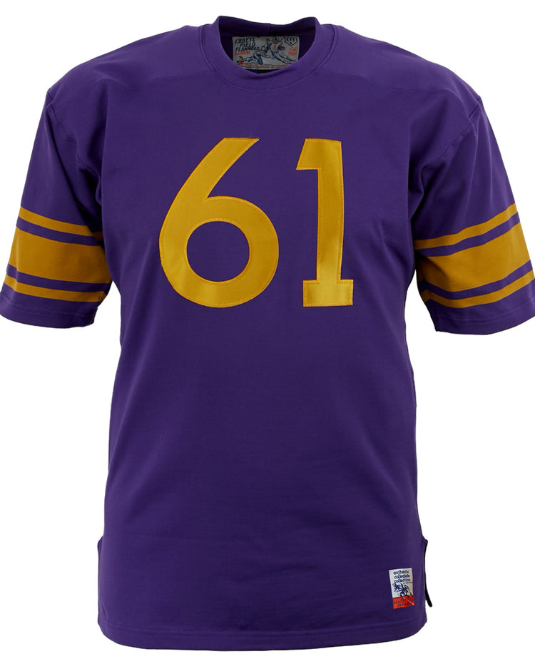 The EFF University of Washington 1970 Durene Football Jersey is an authentic purple replica with gold sleeve stripes and the number 61 in bold gold on the front.