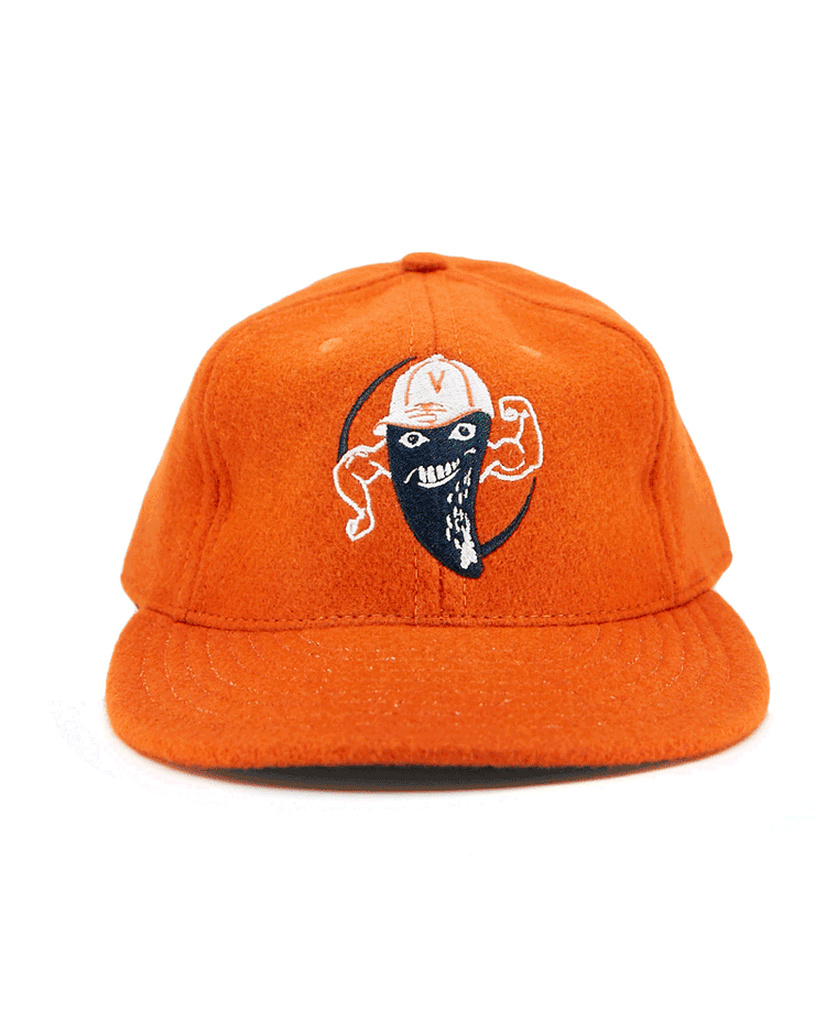The EFF Victoria Mussels 1979 Vintage Ballcap is an orange cap featuring an embroidered grinning, masked face with a white V helmet, centered on the front panel.