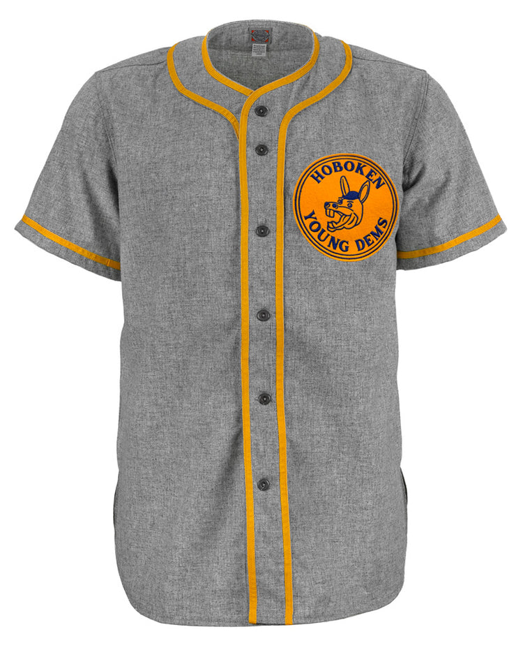 A vintage gray EFF Hoboken Young Democrats 1972 Road Jersey with yellow trim, buttons, and a left chest patch featuring a bird holding a bat—ideal for fans of Little League history.