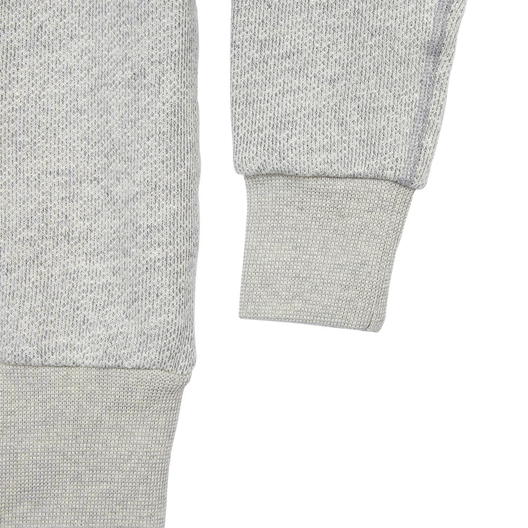 Close-up of the sleeve and waistband on the EFF Portland Beavers Crewneck Sweatshirt in light gray French terry, showing ribbed cuffs and hem with a vintage cut.