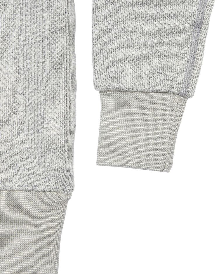 Close-up of the sleeve and waistband on the EFF Portland Beavers Crewneck Sweatshirt in light gray French terry, showing ribbed cuffs and hem with a vintage cut.